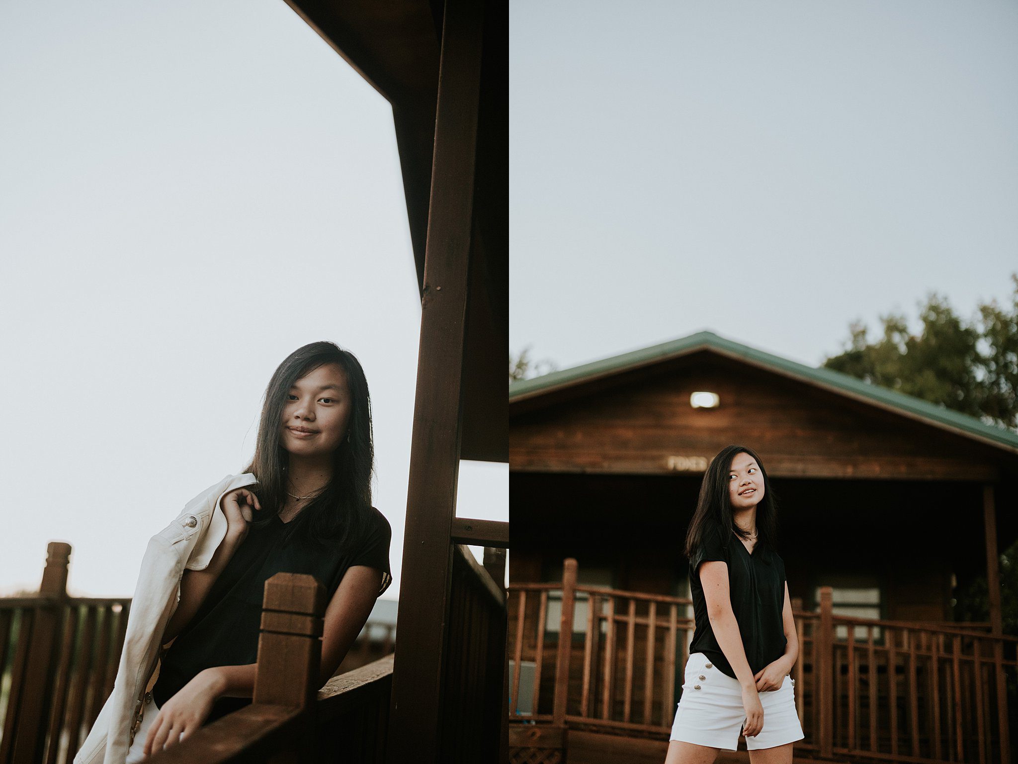 This is a dip-tic photo of a girl with black hair wearing a black shirt and white shorts. She is getting her senior portraits taken at Oak Grove State Park in Northwest Iowa. In the photo on the left she has her white leather jacket tossed over her shoulder and she is looking at the camera. You can see she is leaning on a wooden railing with a roof over her head to the right but mostly blue sky in the background. The photo on the right the same girl is standing in front of the wooden cabin playing with her shirt and smiling towards the left of the frame. 